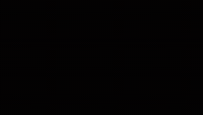 Skull With Glowing Eyes In Dark GIF