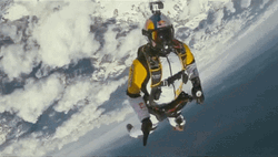 Skydiving High Five GIF