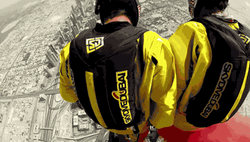 Skydiving With Red Smoke GIF