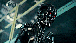 Skynet Standing Up And Looking Away GIF