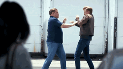 Slap Fight Conan O'Brien GIF