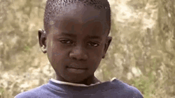 Slapped African Kid GIF