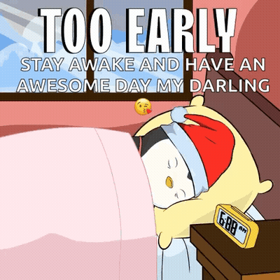 Sleeping Cat Next To Alarm Clock GIF