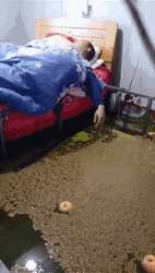 Sleeping Near Flooded Water GIF