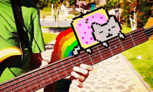 Sleeping Nyan Cat With Guitar Music GIF