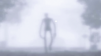 Slender Man Walking Through Fog In Field GIF