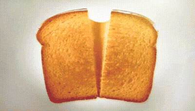 Slice Of Bread Cut In Half With Hole In Middle GIF