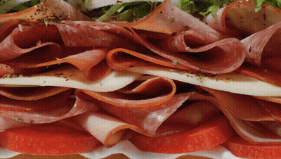 Sliced Meat And Tomatoes On Plate GIF