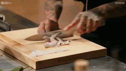 Slicing Squid Tentacles GIF