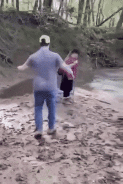 Slipping On River Side GIF