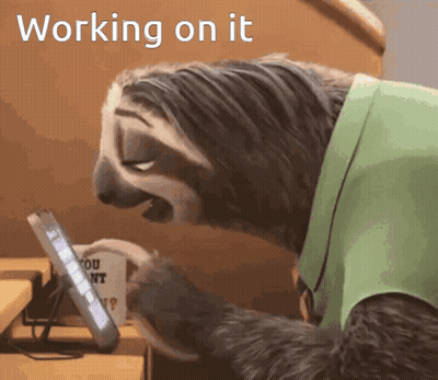 Sloth Looking At Tablet Saying Working On It GIF