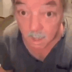 Slow Blinking Drowsy Man Startled GIF