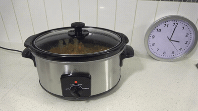 Slow Cooker Next To Clock GIF