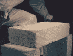 Slow Motion Hollow Block Break Using Karate Chop GIF