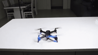 Small Black Drone On Counter GIF