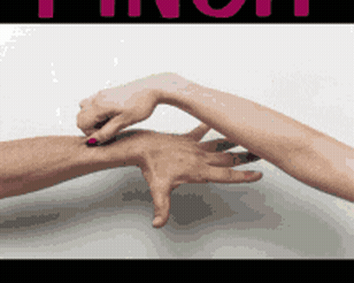 Small Doll In Pink Dress Held In Hands GIF