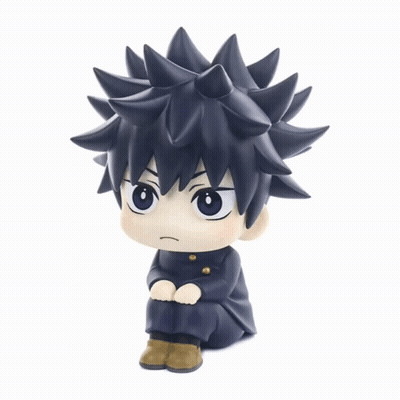 Small Figurine Of Boy With Spiky Hair GIF