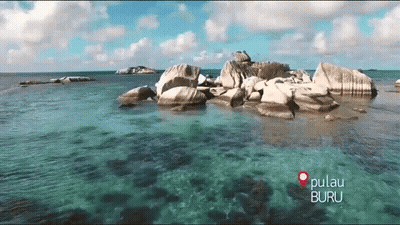Small Island In Ocean With Pulau Buru GIF