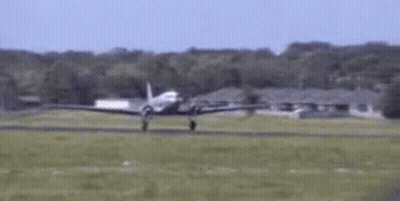 Small Plane Taking Off From Grassy Runway GIF