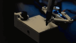Small Robot Writing Time GIF
