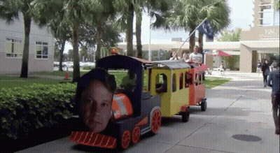 Small Train With Man On Front GIF