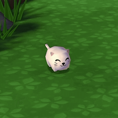 Small White Cat Sitting On Grass GIF