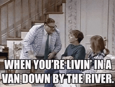 Smashed Up Taxi Driving Down Road GIF
