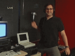 Smashing Computer Fixing Old Computer Meme GIF