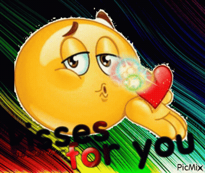 Smiley Blowing Kiss Holding Heart Saying Kisses for You