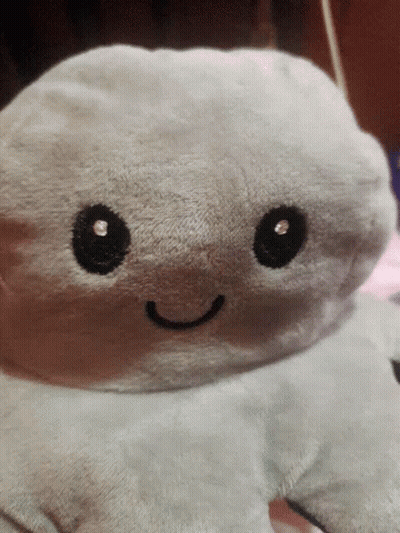 Smiley Face Stuffed Animal GIF