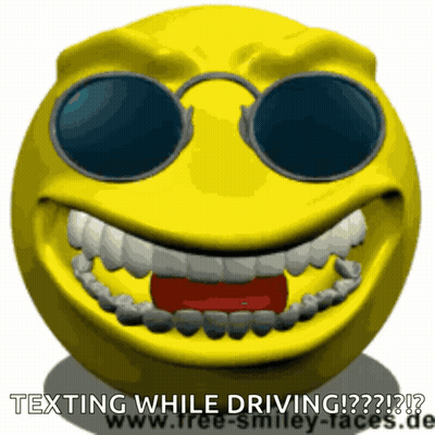 Smiley Face With Sunglasses Texting While Driving GIF