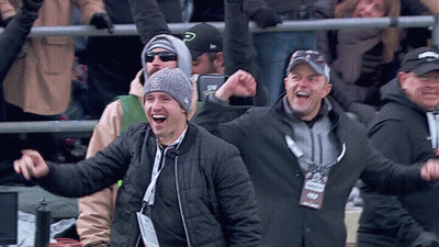 Smiley Face With Wings And Halo Says Lansing Men Omtg You're Hot GIF