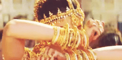 Smiling Ashwarya Wearing Gold Accessories GIF