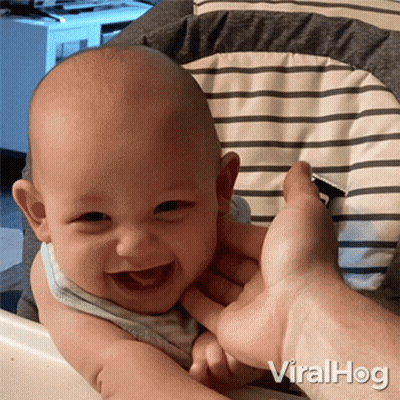 Smiling Baby Held By Person Viralhog GIF
