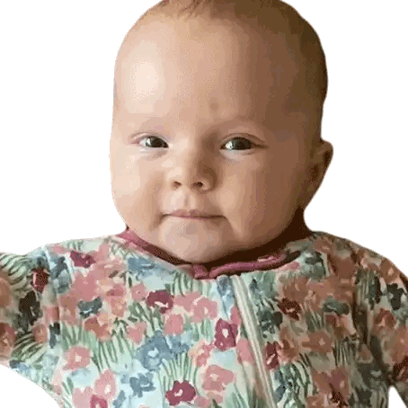 Smiling Baby In Floral Outfit Sticker