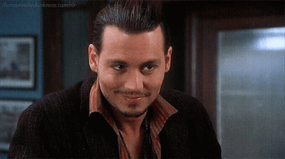 Smiling Bearded Man In Black Jacket And Red Striped Shirt GIF