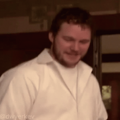 Smiling Bearded Man In White Shirt And Jacket GIF