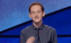 Smiling Boy Pointing GIF