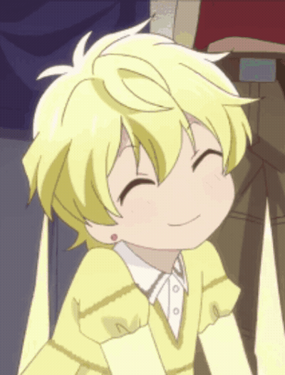 Smiling Boy With Yellow Hair And Sweater GIF