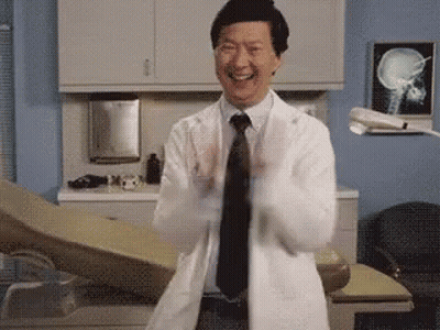 Smiling Doctor In Lab Coat Clapping GIF
