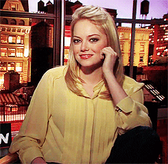 Smiling Emma Stone Finger Gun GIF