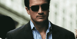 Smiling Eyeglass Nathan Fillion Walking GIF