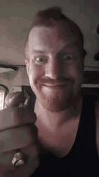 Smiling Guy Lighting Lighter GIF