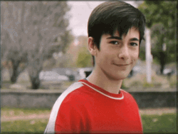 Smiling Kid Thumbs Up GIF