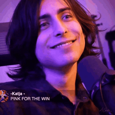 Smiling Long-Haired Man Mic Katja - Pink For The Win GIF