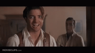 Smiling Man And Man Looking At Camera GIF