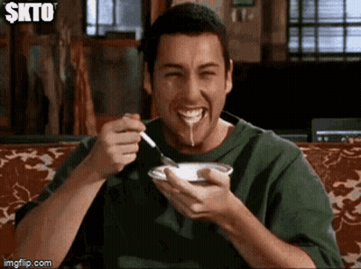 Smiling Man Eating With Spoon GIF