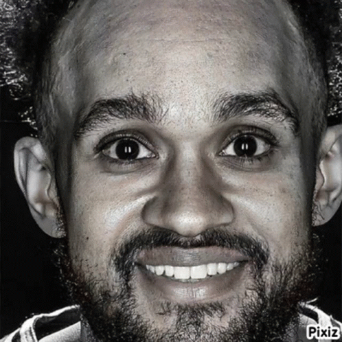 Smiling Man In Black And White GIF