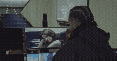 Smiling Man In Front Of Deputy Screen GIF
