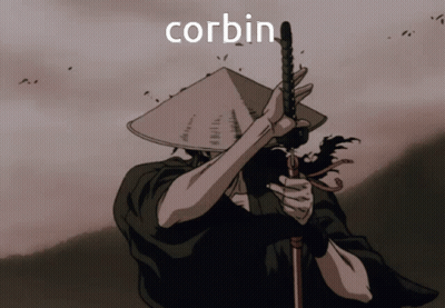 Smiling Man In Suit Says Welcome Corbin To Woman GIF